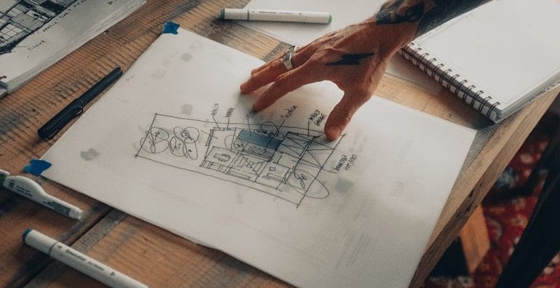 white printer paper on brown wooden table